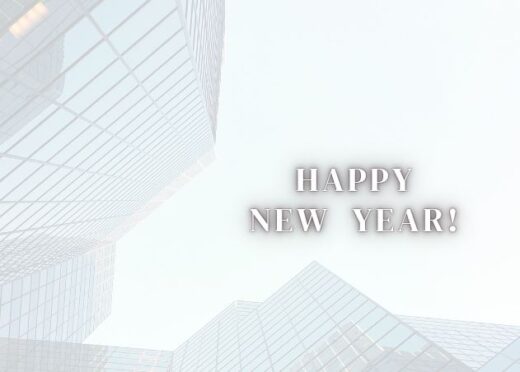A picture of a set of buildings, with the wish 'happy new year'